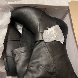 Brand new black stylish boots. Size 9 wide. Brand is Twisted X